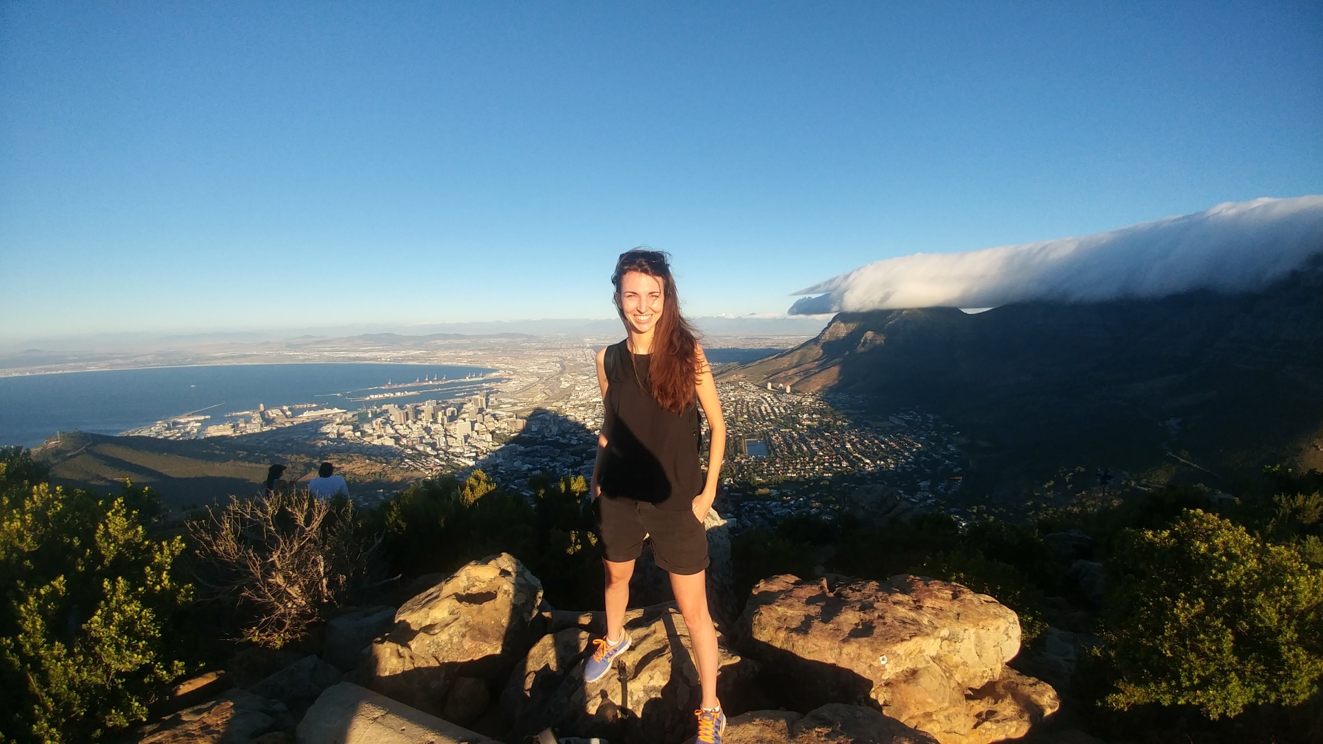 Laura on the summit of Lion's Head, Cape Town, looking out across the city and ocean